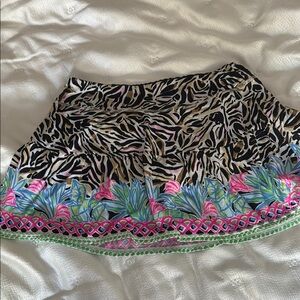 Lilly Pulitzer Luxletic Tennis Skort Black Animal print w/ flower border.